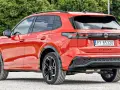 Czerwony Volkswagen Tiguan, z tablicą rejestracyjną PY 85320. Sprawdź aktualną volkswagen tiguan cena.