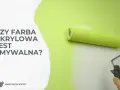 Wałek malarski pokrywa ścianę jasną zieloną farbą. Czy farba akrylowa jest zmywalna? Dowiedz się więcej na www.woow.expert.