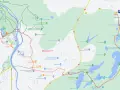 Mapa turystyczna Geopark Łuk Mużakowa z zaznaczoną trasą spacerową, jeziorami i punktami widokowymi.