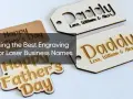 Wooden tags with "Daddy" and "Happy Father's Day" in laser fonts. The text "Choosing the Best Engraving Font for Laser Business Names" is overlaid.