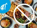 Symbol woreczka żółciowego i zakazane jedzenie typu fast food. Dieta dla woreczka żółciowego powinna unikać takich potraw.