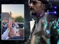 Koncertowy klimat z tłumem bawiącym się przy muzyce, a w tle widać fragmenty występu przypominającego styl **Gigi D'Agostino**.