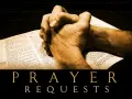 Hands clasped in prayer over an open Bible, with "PRAYER REQUESTS" displayed below.