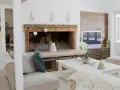 Un camino rustico con decorazioni a cuore e una brocca bianca, un'idea per come decorare un camino in stile country.