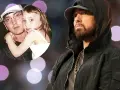 Kto to Eminem? Raper w czarnej bluzie z kapturem i złotym łańcuchem, obok zdjęcie z córką.