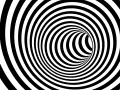 En svartvit tunnel med spiralmönster som kan ge känslan av ångest tankar.