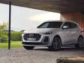 Nowy Audi Q5 naładuje się w nowoczesnym garażu. Sprawdź atrakcyjną audi q5 cena.