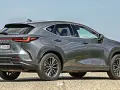 Szary Lexus NX 450h+ na drodze, w tle pole rzepaku. Sprawdź aktualną lexus nx cena.