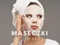 Kobieta z ręcznikiem na głowie stosuje maseczkę na niedoskonałości. Tekst: "MASECZKI DO TWARZY".