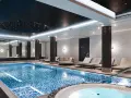 Basen i jacuzzi w Radisson Collection Hotel Warsaw. Relaks w nowoczesnym spa z leżakami i gwiazdami na suficie.