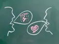Chalk drawings of two profiles facing each other. One speaks of storms, the other of love, illustrating how do we love our enemies.