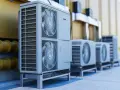 Rząd nowoczesnych jednostek zewnętrznych, w tym potężna pompa ciepła 60 kW, gotowych do zapewnienia wydajnego ogrzewania i chłodzenia.