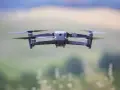 A drone hovers mid-air, its propellers blurred with motion. Planning to fly one in the Dominican Republic? Be sure to check the Dominican Republic drone laws first.
