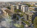 Un vecchio edificio industriale si trasforma in un nuovo piano casa con appartamenti moderni, giardini pensili e pannelli solari.