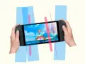 Manos sujetando una Nintendo Switch 2 Lite jugando a Super Mario Bros.