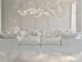 Sofá blanco y mullido con cojines, bajo una nube luminosa que evoca un **cloud dancer color** etéreo.
