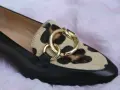 Mocassino donna con stampa leopardata e dettagli oro. Perfetto per chi cerca scarpe donna numeri grandi con stile.