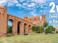 Imponujący zamek i katedra w Kwidzynie, jedne z najciekawszych atrakcji w województwie pomorskim, pod błękitnym niebem.