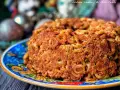 Anelletti alla siciliana dorati e croccanti, un classico piatto siciliano pronto per essere gustato.