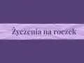 Fioletowa taśma z napisem "Życzenia na roczek". Idealna do ozdobienia kartek z życzeniami.