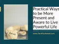 A stone with "here" written on it, symbolizing how to be present and live a powerful life.