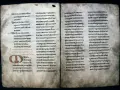Ancient manuscript page with Latin text, likely a St. Benedict prayer, featuring illuminated initial 'O'.