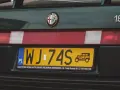 Zielona Alfa Romeo z tablicą rejestracyjną WJ-74S. Klasyk pod opieką auto serwisu.