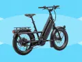 A black electric cargo bike with a long frame and rear rack, perfect for hauling groceries or kids.