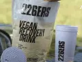Opakowanie wegańskiego napoju regeneracyjnego 226ERS z białym shakerem. Idealny WPI dla sportowców.