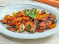 Carote in agrodolce, caramellate e speziate, con aglio e menta fresca, un'esplosione di sapori.