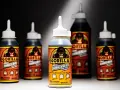 Several bottles of Gorilla Glue are displayed. The front bottle shows "how much weight can Gorilla Glue hold" is a question answered by its "Incredibly Strong" bond.