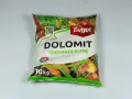 Opakowanie nawozu "Dolomit" marki Target. Produkt odkwasza glebę, nie jest szkodliwy dla roślin, zawiera wapń i magnez. 10 kg.