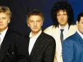 Les quatre membres de Queen posent ensemble, prêts à conquérir le monde avec leur musique légendaire.
