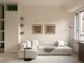 Soggiorno luminoso con divano bianco, quadri antichi e arredi funzionali, perfetto per case piccole ben arredate.