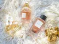 Kolekcja perfum: Daisy, Aqua Allegoria Guerlain, L'Impératrice D&G i The One Dolce & Gabbana. Delikatny, kwiatowy **styraks** unosi się w powietrzu.