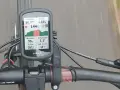 Na ekranie licznika rowerowego Garmin widać, jak obliczyć tętno podczas jazdy: 144 bpm, dystans 4.69 km, prędkość 20 km/h.