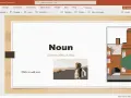 Prezentacja pptx z definicją "Noun" i ilustracjami. Czerwona strzałka wskazuje menu "File".