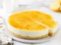 Tarta de limón cremosa con cobertura dorada y base crujiente. ¡Perfecta para cualquier ocasión!