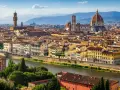 Florence skyline with the Arno River, featuring the Duomo and Palazzo Vecchio, iconic landmarks near the Uffizi Gallery and Accademia.