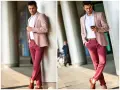 Elegancki mężczyzna w różowej marynarce i bordowych spodniach. Szukasz marek odzieży męskiej, które oferują najlepszy stosunek jakości do ceny na co dzień?