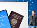 Mężczyzna zastanawia się, ile kosztuje ETA do UK. Obok polski paszport i telefon z instrukcją aplikacji.