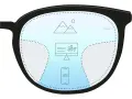 Okulary z soczewkami Zeiss pokazują góry, monitor i smartfon.