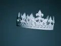 Biała korona z liliami, zawieszona na nitce. Czy to symbol władzy, czy może ukryte elżbieta rakuszanka ciekawostki?