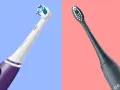 Fioletowa szczoteczka soniczna Oral-B iO obok grafitowej szczoteczki elektrycznej ORDO. Wybierz najlepszą dla siebie!
