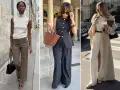 Tre donne sfoggiano un elegante outfit ufficio: pantaloni a palazzo, gilet gessato e trench.