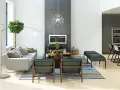 Nowoczesne wnętrza: szara sofa, kominek, designerskie krzesła i kuchnia. Różnorodne style wnętrz w jednym, przestronnym salonie.