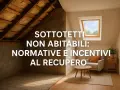 Sottotetti non abitabili: un'ispezione rivela normative e incentivi per il recupero. Spazio con poltrona, tavolino e lucernario.