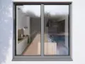 Vue d'une cuisine moderne et d'une salle à manger à travers un ouvrant fenêtre.