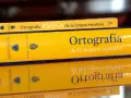Libros de "Ortografía de la lengua española" de la Real Academia Española, esenciales para aprender el abecedario español.