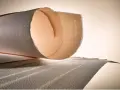 Rouleaux de papier Arches France, révélant la texture papier aquarelle unique. L'art commence ici.